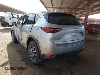 2017 Mazda CX-5 Grand Touring with VIN JM3KFADL3H0121772, listed as a IAAI auction lot 41935183 with 48,869 mi miles and . Bid and sale history available at carsss.com. Image 3.
