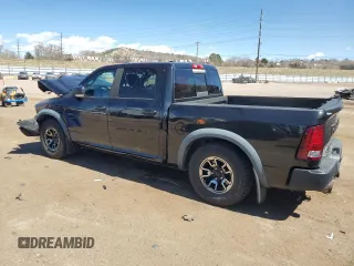 2016 Ram 1500 Rebel z VIN 1C6RR7YT7GS185917, wystawiony jako Copart lot #50464895 z przebiegiem 94 389 mil mil oraz Szkody całkowita. Historia ofert i sprzedaży dostępna na DreamBid. Obrazek 2.