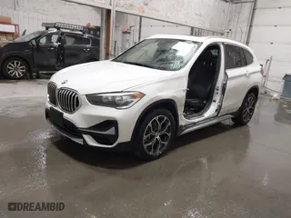 2021 BMW X1 xDrive28i with VIN WBXJG9C03M5T23289, listed as a IAAI auction lot 41603974 with 60,798 mi miles. Bid and sale history available at carsss.com. Image 17.
