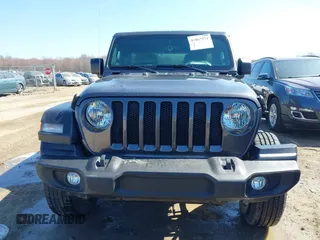 2022 Jeep Wrangler Unlimited Willys with VIN 1C4HJXDN1NW144112, listed as a IAAI auction lot 41867571 with 63,876 mi miles and . Bid and sale history available at DreamBid. Image 13.