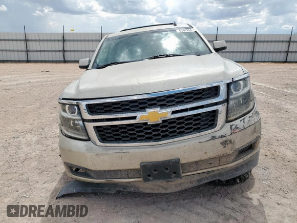 2015 Chevrolet Suburban LT with VIN 1GNSCJKC0FR153454, listed as a Copart auction lot 62672615 with 184,498 mi miles and Salvage title. Bid and sale history available at DreamBid. Image 5.