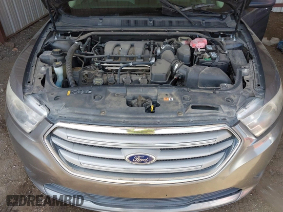 2014 Ford Taurus SE with VIN 1FAHP2D89EG136335, listed as a IAAI auction lot 41880655 with 211,635 mi miles. Bid and sale history available at carsss.com. Image 10.
