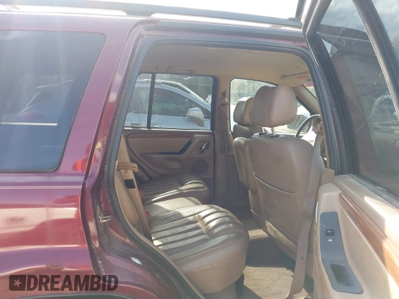 1999 Jeep Grand Cherokee Limited with VIN 1J4GW68N8XC595697, listed as a IAAI auction lot 41917466 with 177,944 mi miles. Bid and sale history available at carsss.com. Image 8.