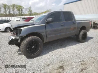 2010 Nissan Titan LE with VIN 1N6BA0EC1AN325055, listed as a Copart auction lot 51471785 with 137,110 mi miles and Salvage Title. Bid and sale history available at carsss.com. Image 1.