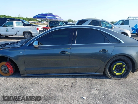 2015 Audi S8 z VIN WAUK2AFD5FN021986, wystawiony jako IAAI lot #41986491 z przebiegiem 142 073 mil mil oraz . Historia ofert i sprzedaży dostępna na DreamBid. Obrazek 14.
