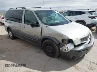 2004 Pontiac Montana 1SA z VIN 1GMDX03E14D107346, wystawiony jako IAAI lot #41584264 z przebiegiem 165 659 mil mil oraz . Historia ofert i sprzedaży dostępna na DreamBid. Obrazek 1.