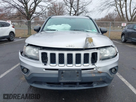 2014 Jeep Compass Sport with VIN 1C4NJDBB8ED734667, listed as a IAAI auction lot 41836914 with 221,028 mi miles. Bid and sale history available at carsss.com. Image 12.