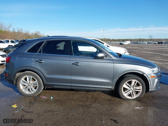 2016 Audi Q3 Premium Plus with VIN WA1BFCFSXGR014778, listed as a IAAI auction lot 41285863 with 73,044 mi miles. Bid and sale history available at carsss.com. Image 13.