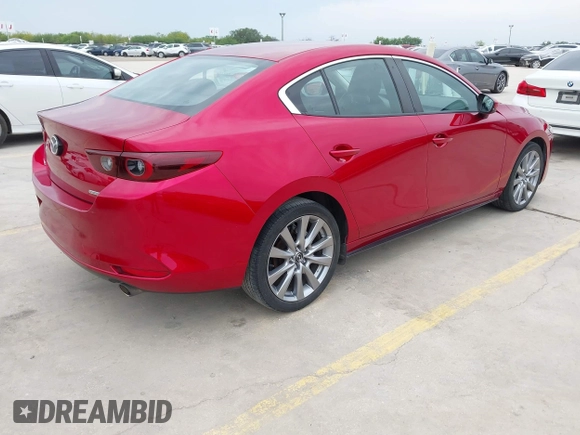 2022 Mazda 3 Select z VIN 3MZBPABL9NM316998, wystawiony jako IAAI lot #42117951 z przebiegiem 44 594 mil mil oraz . Historia ofert i sprzedaży dostępna na DreamBid. Obrazek 4.