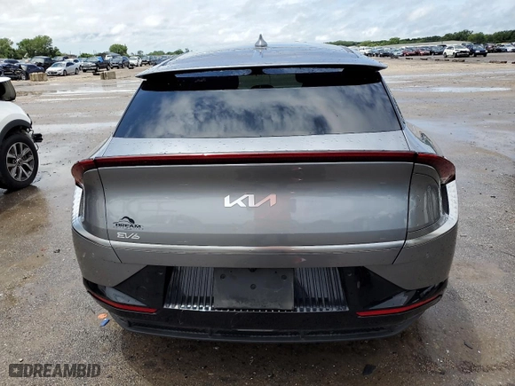 2023 Kia EV6 Wind with VIN KNDC3DLC0P5122467, listed as a Copart auction lot 61112594 with 9,645 mi miles and Salvage Title. Bid and sale history available at carsss.com. Image 6.