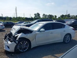 2019 Infiniti Q50 Luxe with VIN JN1EV7ARXKM557946, listed as a IAAI auction lot 40362058 with 56,615 mi miles and . Bid and sale history available at carsss.com. Image 14.