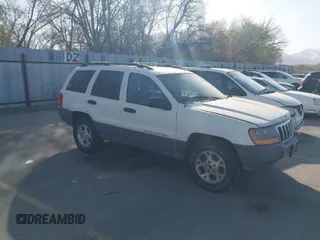2000 Jeep Grand Cherokee Laredo z VIN 1J4GW48S9YC159761, wystawiony jako IAAI lot #41999818 z przebiegiem 151 708 mil mil oraz . Historia ofert i sprzedaży dostępna na DreamBid. Obrazek 1.