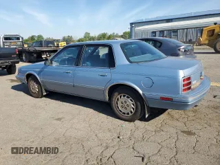 1993 Oldsmobile Cutlass Ciera S z VIN 1G3AG54N3P6330824, wystawiony jako Copart lot #59590864 z przebiegiem 2689 mil mil oraz Tytuł czysty. Historia ofert i sprzedaży dostępna na DreamBid. Obrazek 2.