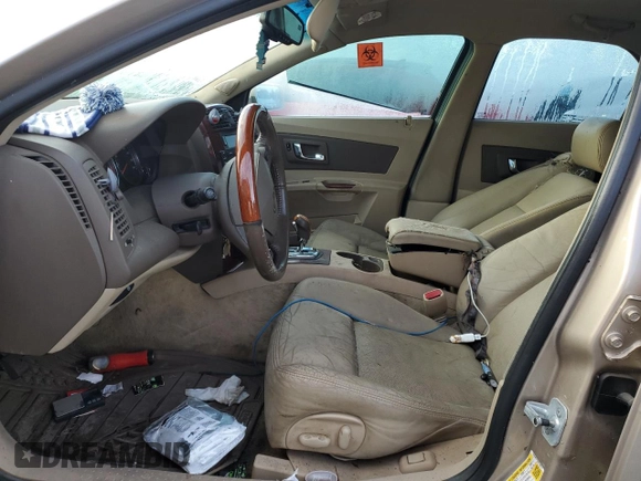 2006 Cadillac CTS with VIN 1G6DM57T560148515, listed as a Copart auction lot 77073384 with Not Provided miles and Salvage Title. Bid and sale history available at carsss.com. Image 7.