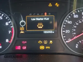 2016 Kia Optima SXL Turbo with VIN 5XXGV4L20GG023095, listed as a IAAI auction lot 41580598 with 155,002 mi miles. Bid and sale history available at carsss.com. Image 7.