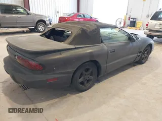2000 Pontiac Firebird Firebird z VIN 2G2FS32KXY2146392, wystawiony jako IAAI lot #42506629 z przebiegiem 161 077 mil mil oraz . Historia ofert i sprzedaży dostępna na DreamBid. Obrazek 4.