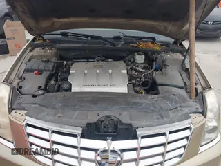 2006 Cadillac DTS 1SC z VIN 1G6KD57Y56U102470, wystawiony jako IAAI lot #40758530 z przebiegiem 149 330 mil mil oraz . Historia ofert i sprzedaży dostępna na DreamBid. Obrazek 10.