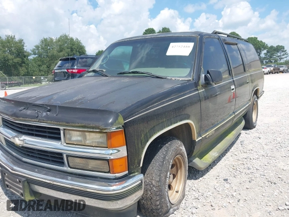 1996 Chevrolet Suburban with VIN 3GNEC16R3TG120004, listed as a IAAI auction lot 42752410 with 291,491 mi miles and . Bid and sale history available at DreamBid. Image 6.