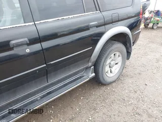 2000 Mitsubishi Montero Sport LS with VIN JA4LS31HXYP037471, listed as a IAAI auction lot 41820992 with 141,567 mi miles. Bid and sale history available at carsss.com. Image 15.