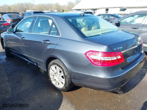 2013 Mercedes-Benz E-Class E 350 Luxury with VIN WDDHF8JB0DA707640, listed as a IAAI auction lot 41916454 with 104,469 mi miles. Bid and sale history available at carsss.com. Image 3.