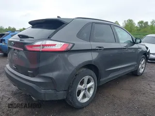 2020 Ford Edge SE z VIN 2FMPK4G94LBB18927, wystawiony jako IAAI lot #42332042 z przebiegiem 86 720 mil mil oraz . Historia ofert i sprzedaży dostępna na DreamBid. Obrazek 4.