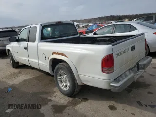 2001 Dodge Dakota Sport with VIN 1B7GL22N31S250879, listed as a Copart auction lot 47322845 with 207,334 mi miles and Salvage Title. Bid and sale history available at carsss.com. Image 2.