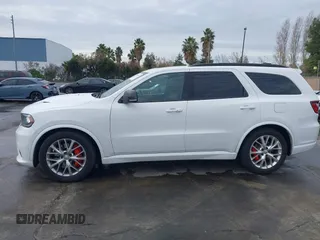 2018 Dodge Durango SRT with VIN 1C4SDJGJ5JC262338, listed as a IAAI auction lot 41106320 with 89,046 mi miles and . Bid and sale history available at DreamBid. Image 14.