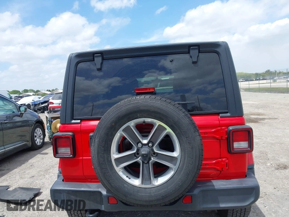 2019 Jeep Wrangler Unlimited Sahara with VIN 1C4HJXEG4KW573157, listed as a IAAI auction lot 42118373 with 105,890 mi miles and . Bid and sale history available at DreamBid. Image 16.