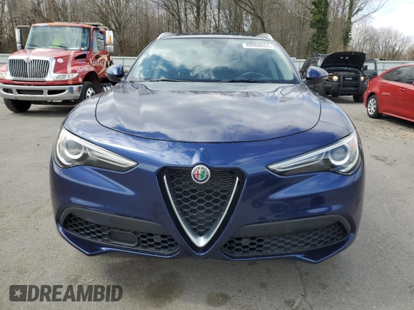 2020 Alfa Romeo Stelvio Ti z VIN ZASPAKBN8L7C76865, wystawiony jako Copart lot #49966655 z przebiegiem 26 531 mil mil oraz Szkody całkowita. Historia ofert i sprzedaży dostępna na DreamBid. Obrazek 5.