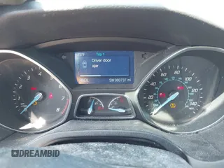 2014 Ford Focus SE with VIN 1FADP3F27EL312349, listed as a IAAI auction lot 42121230 with 80,737 mi miles and . Bid and sale history available at DreamBid. Image 7.