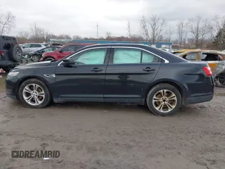 2013 Ford Taurus SEL with VIN 1FAHP2E87DG180296, listed as a IAAI auction lot 42016506 with 137,352 mi miles. Bid and sale history available at carsss.com. Image 14.