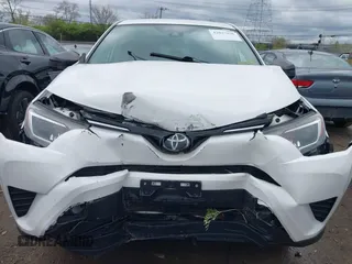 2018 Toyota RAV4 LE with VIN 2T3BFREVXJW793174, listed as a IAAI auction lot 42037936 with 82,304 mi miles. Bid and sale history available at carsss.com. Image 12.