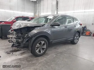 2021 Honda CR-V LX with VIN 2HKRW2H27MH643851, listed as a IAAI auction lot 40630925 with 75,427 mi miles. Bid and sale history available at carsss.com. Image 2.