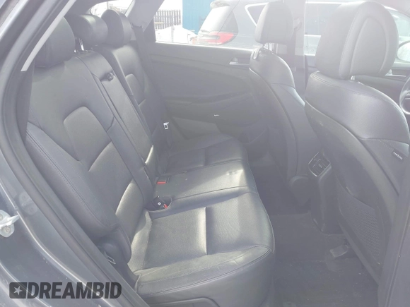 2017 Hyundai Tucson Limited with VIN KM8J3CA27HU307808, listed as a IAAI auction lot 41980342 with 91,669 mi miles. Bid and sale history available at carsss.com. Image 8.