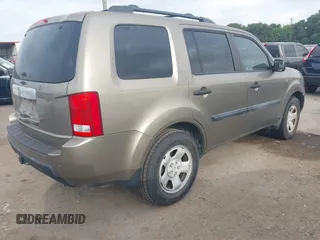 2011 Honda Pilot LX with VIN 5FNYF3H2XBB045721, listed as a IAAI auction lot 42791364 with 149,258 mi miles and . Bid and sale history available at DreamBid. Image 4.