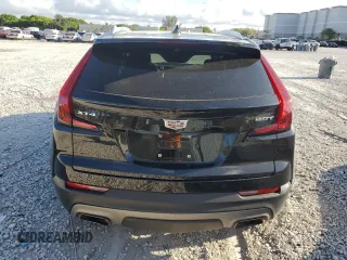2019 Cadillac XT4 FWD Premium Luxury with VIN 1GYFZCR46KF117955, listed as a Copart auction lot 62145385 with 10,474 mi miles and Salvage title. Bid and sale history available at DreamBid. Image 6.