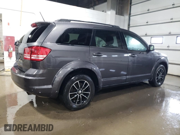 2017 Dodge Journey SE z VIN 3C4PDCAB5HT682795, wystawiony jako Copart lot #57478495 z przebiegiem 120 355 mil mil oraz Czysty tytuł • Clean title. Historia ofert i sprzedaży dostępna na DreamBid. Obrazek 3.