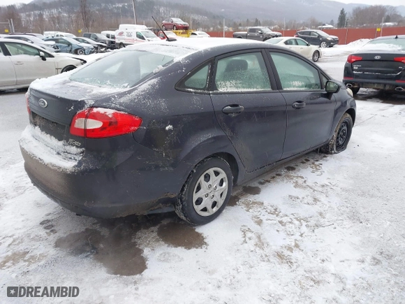 2013 Ford Fiesta S with VIN 3FADP4AJ5DM108912, listed as a IAAI auction lot 41303804 with 100,865 mi miles. Bid and sale history available at carsss.com. Image 4.