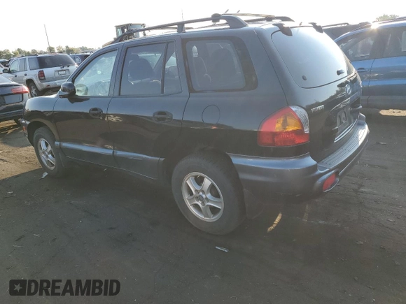 2002 Hyundai Santa Fe GLS with VIN KM8SC73D62U175237, listed as a Copart auction lot 63607054 with 129,087 mi miles and Salvage Title. Bid and sale history available at DreamBid. Image 2.