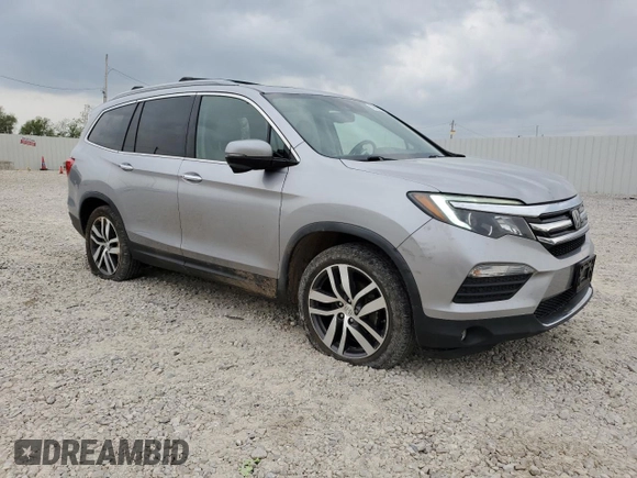 2017 Honda Pilot Touring z VIN 5FNYF6H92HB006855, wystawiony jako Copart lot #53650655 z przebiegiem 130 732 mil mil oraz Szkoda całkowita • Salvage title. Historia ofert i sprzedaży dostępna na DreamBid. Obrazek 4.