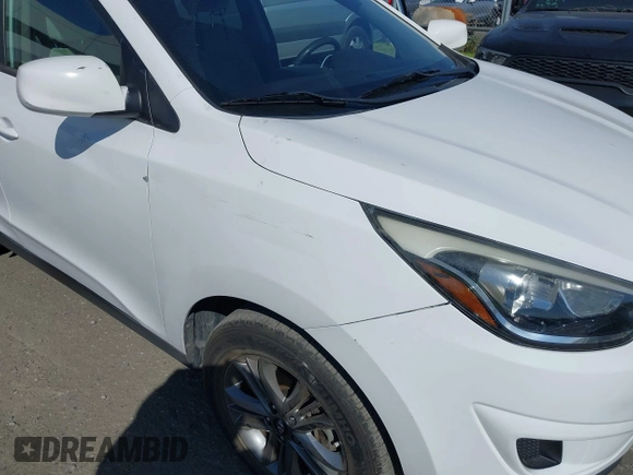 2015 Hyundai Tucson GLS with VIN KM8JT3AF9FU011348, listed as a IAAI auction lot 41860519 with 68,629 mi miles and . Bid and sale history available at DreamBid. Image 12.