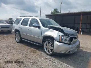 2012 Chevrolet Tahoe LT z VIN 1GNSKBE03CR124911, wystawiony jako IAAI lot #40066894 z przebiegiem 151 551 mil mil oraz . Historia ofert i sprzedaży dostępna na DreamBid. Obrazek 1.