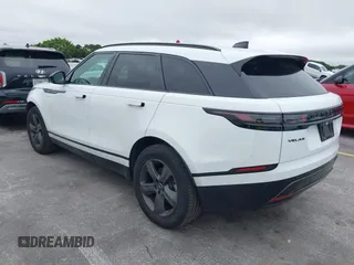 2025 Land Rover Range Rover Velar Dynamic SE с VIN SALYL2EX3SA398659, выставлен на аукционе IAAI как лот 41335449 с пробегом 14 875 миль миль и . История ставок и продаж доступна на DreamBid. Изображение 3.