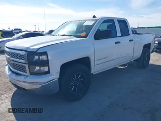 2014 Chevrolet Silverado 1500 LT with VIN 1GCVKREH4EZ343111, listed as a IAAI auction lot 41339803 with 185,314 mi miles and . Bid and sale history available at DreamBid. Image 2.