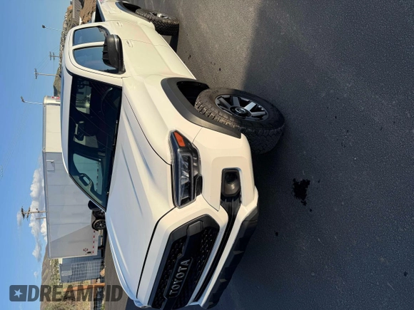 2017 Toyota Tacoma SR5 z VIN 3TMDZ5BN5HM034991, wystawiony jako Copart lot #55537765 z przebiegiem 100 731 mil mil oraz Czysty tytuł • Clean title. Historia ofert i sprzedaży dostępna na DreamBid. Obrazek 2.