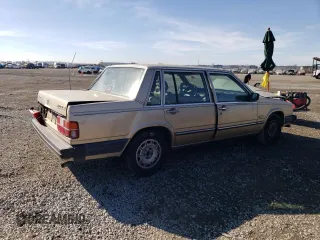 1988 Volvo 740 with VIN YV1FX8849J2284577, listed as a Copart auction lot 86113524 with 199,153 mi miles and Salvage Title. Bid and sale history available at carsss.com. Image 3.