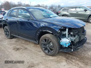 2025 Mazda CX-30 S Select Sport z VIN 3MVDMBBM0SM794529, wystawiony jako IAAI lot #42018655 z przebiegiem 731 mil mil oraz . Historia ofert i sprzedaży dostępna na DreamBid. Obrazek 1.