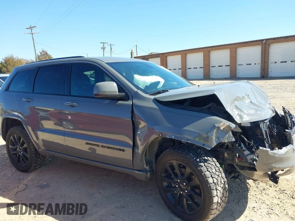 2019 Jeep Grand Cherokee Laredo E with VIN 1C4RJFAG2KC855108, listed as a IAAI auction lot 41780277 with 81,283 mi miles and . Bid and sale history available at DreamBid. Image 14.