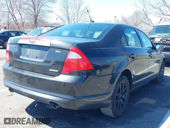 2011 Ford Fusion SEL with VIN 3FAHP0JGXBR125025, listed as a IAAI auction lot 41901192 with 165,822 mi miles. Bid and sale history available at carsss.com. Image 4.