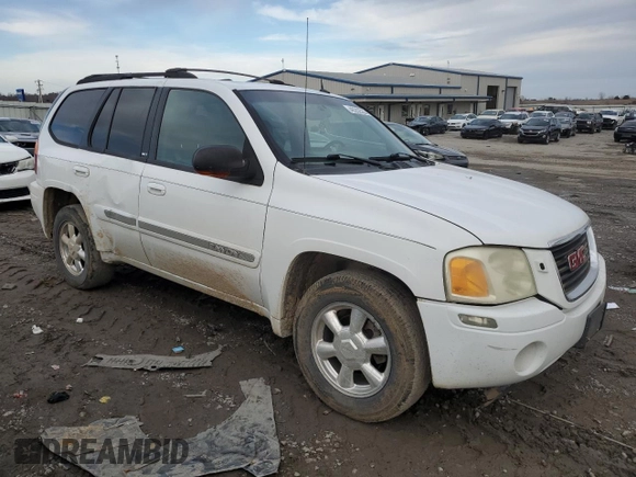 2004 GMC Envoy SLT z VIN 1GKDT13S242171925, wystawiony jako Copart lot #46262535 z przebiegiem 200 396 mil mil oraz Szkoda całkowita • Salvage title. Historia ofert i sprzedaży dostępna na DreamBid. Obrazek 4.